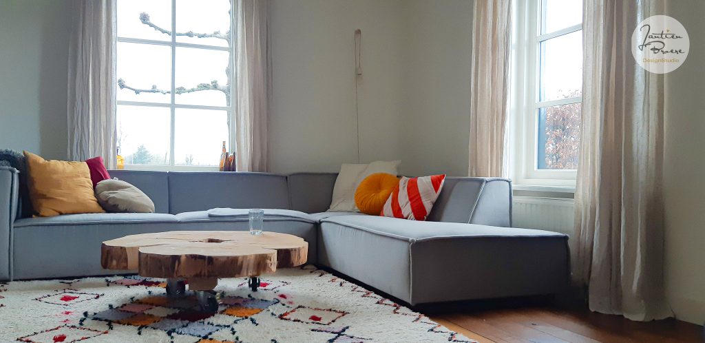 Duurzaam interieuradvies voor woonkamer met hergebruik van meubels en materialen